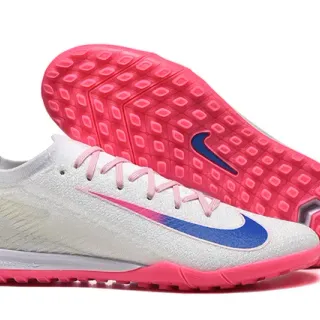 Nike Tênis de futebol Turf branco e rosa com upper de knit, silueta low-cut