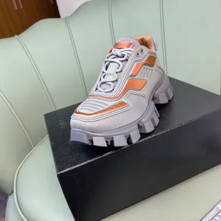 Prada Cloudbust Gris et Orange sneakers épaisses