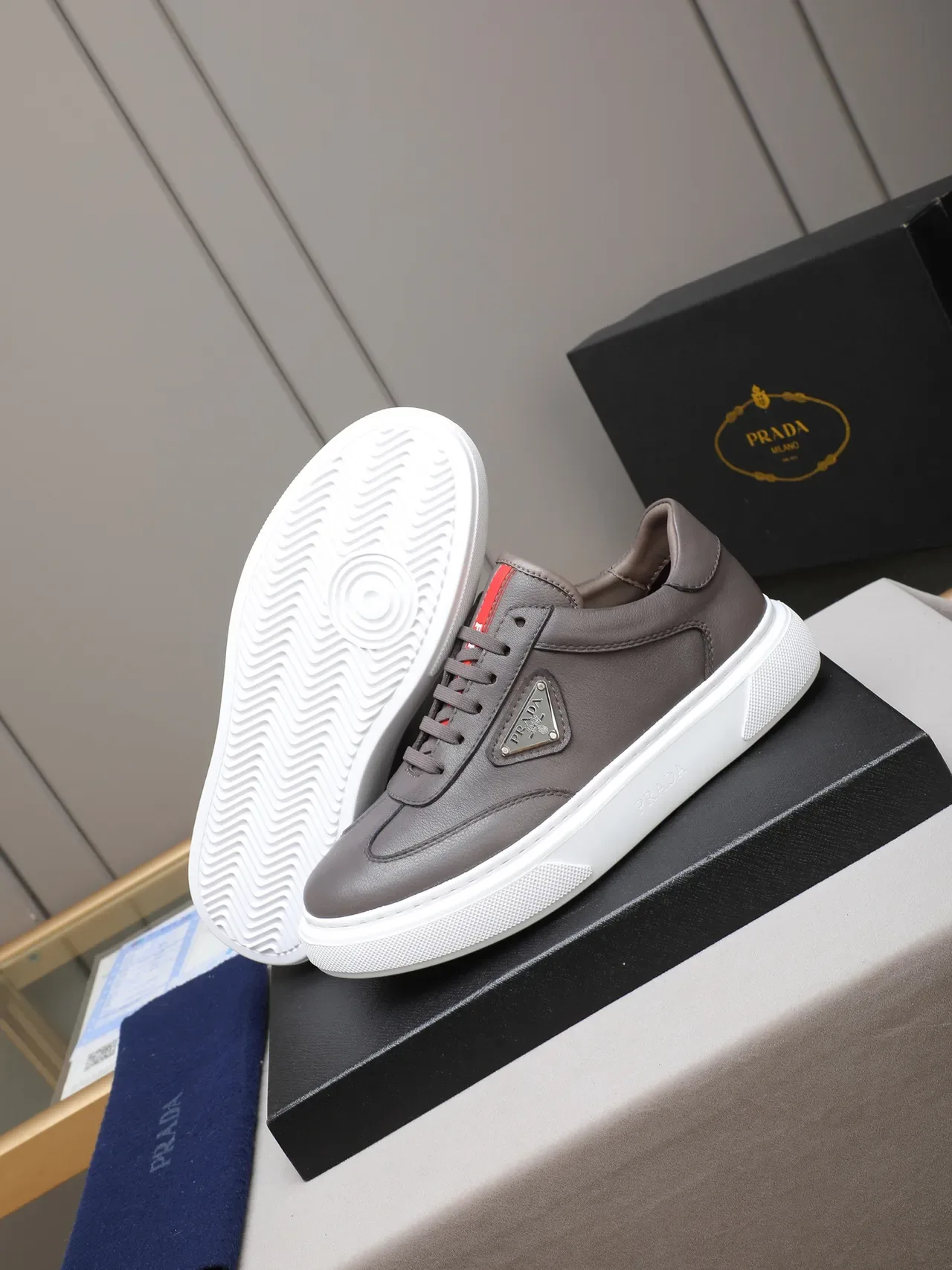 Prada Cloudbust Gray White Leather Upper Triangular Metal Logo Patch Lifestyle Sneakers 4