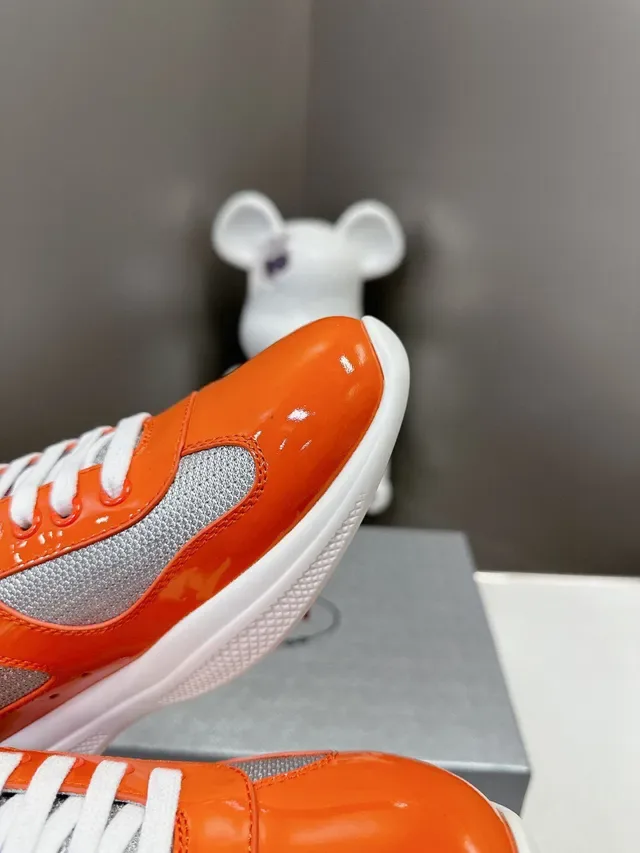 Prada Cloudbust Orange Gray Glossy Patent Leather Mesh Paneling Lifestyle Sneakers 6