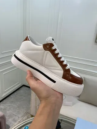 Prada Cloudbust حذاء رياضي أبيض وبني من الجلد منصة نمط حياة 7