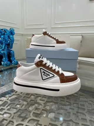 Prada Cloudbust حذاء رياضي أبيض وبني من الجلد منصة نمط حياة 8