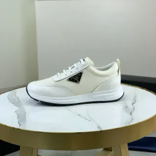 Prada White Black Leather Upper Triangular Metal Logo Plaque Lifestyle Sneakers