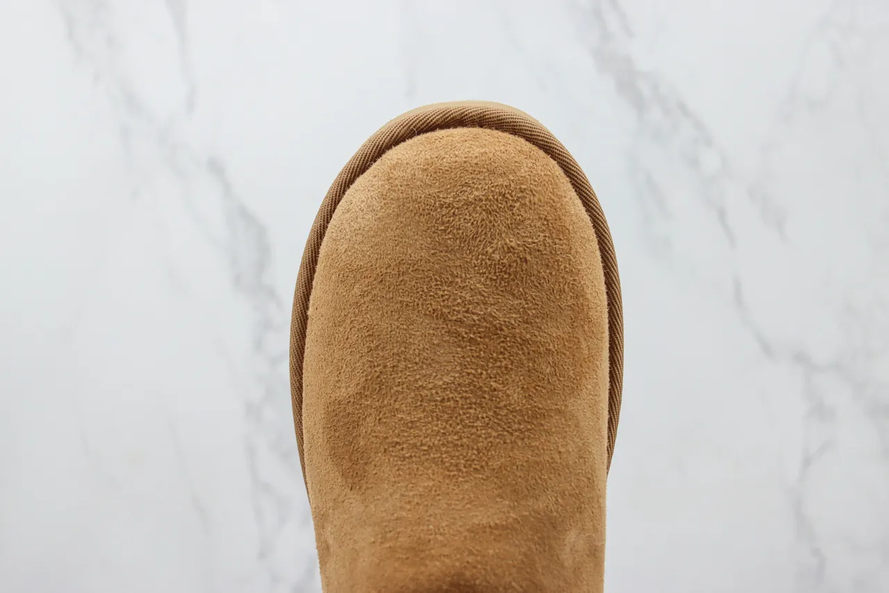 UGG Classic Mini Bow 棕色麂皮羊毛内里雪靴 4