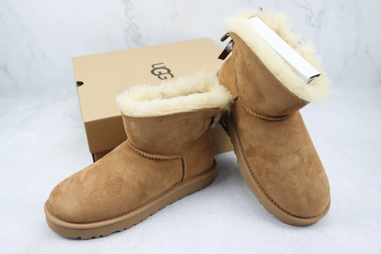 UGG Classic Mini Bow 棕色麂皮羊毛内里雪靴 6