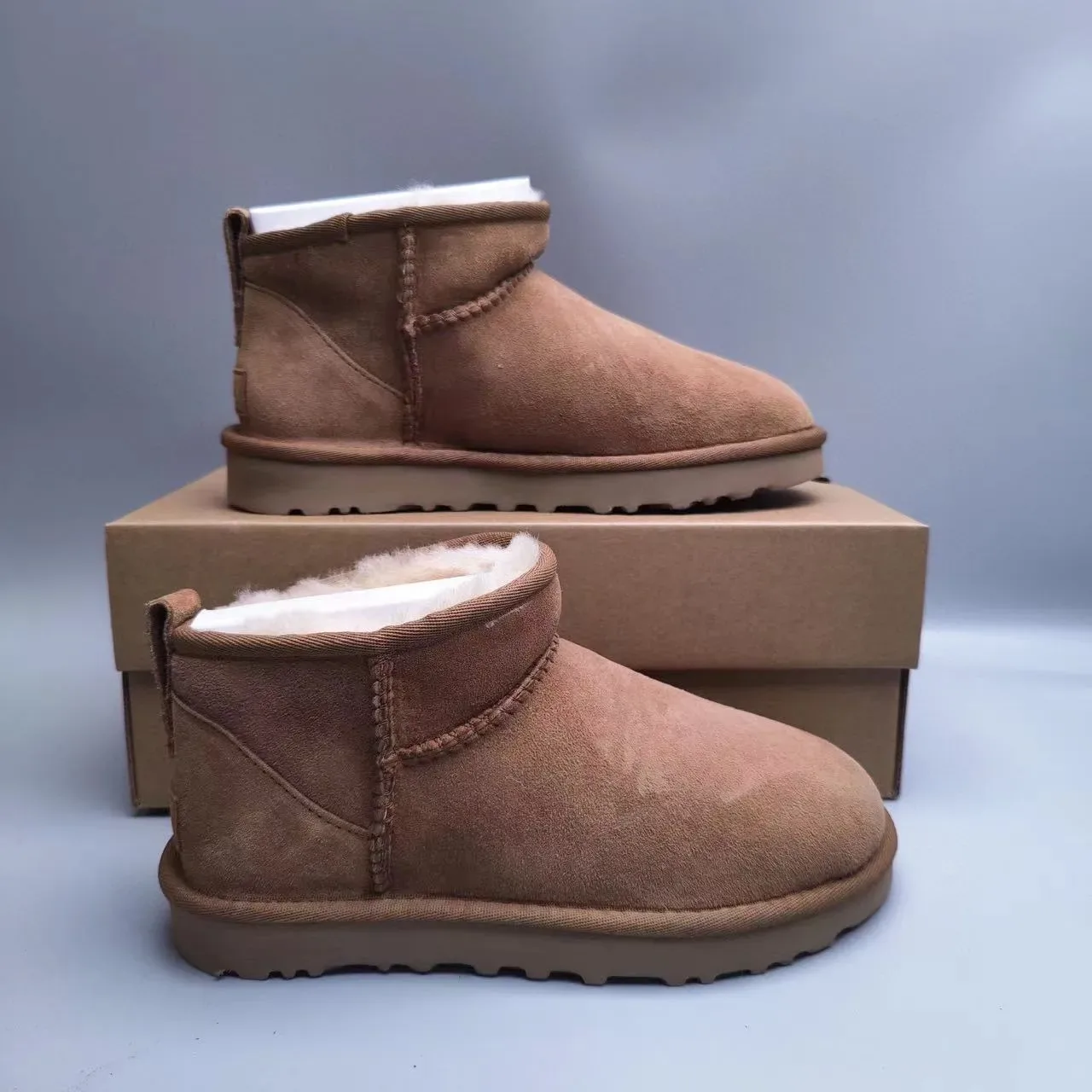 UGG क्लासिक मिनी चेस्टनट ब्राउन सूड शीयरलिंग लाइनड स्नो बूट 2