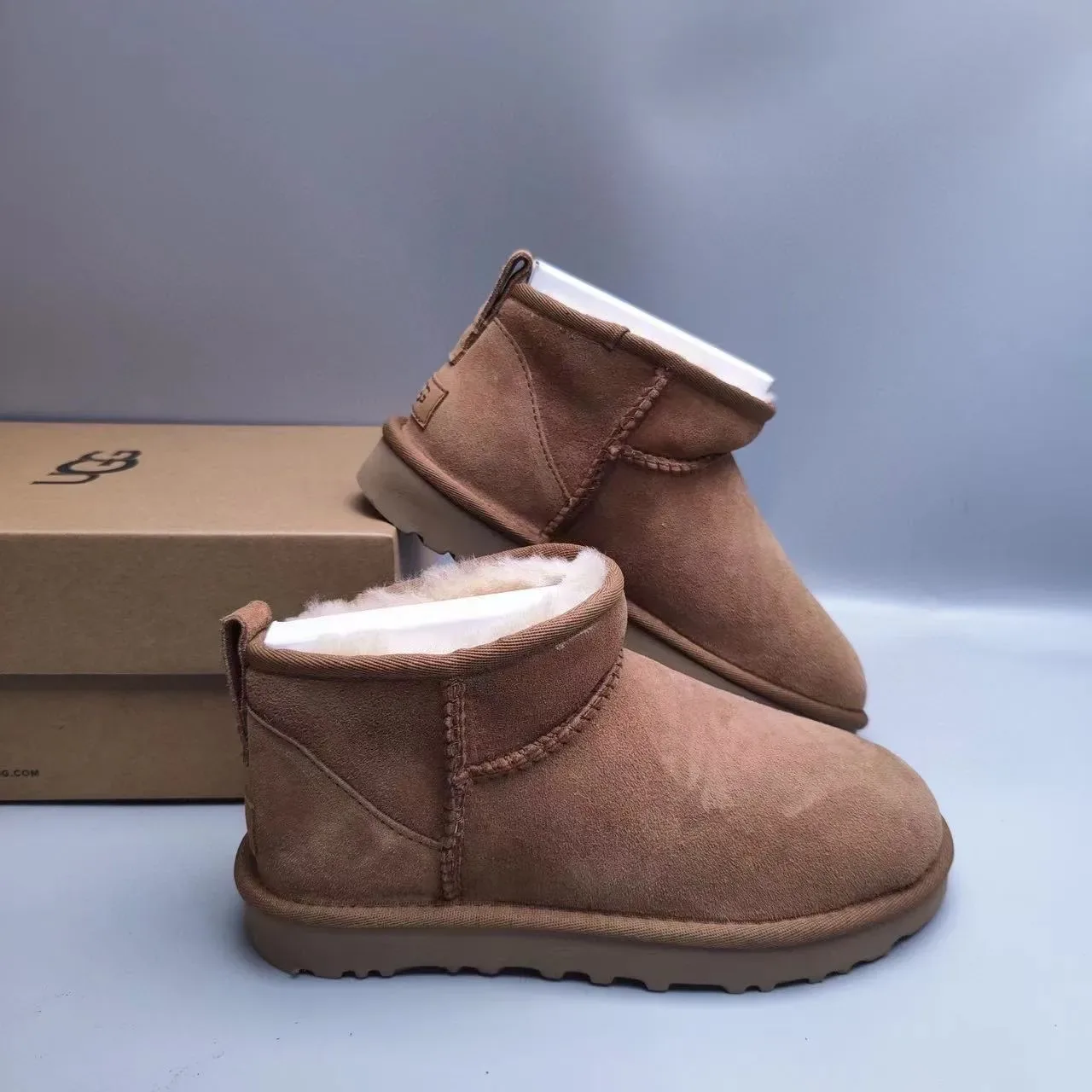 UGG क्लासिक मिनी चेस्टनट ब्राउन सूड शीयरलिंग लाइनड स्नो बूट 5