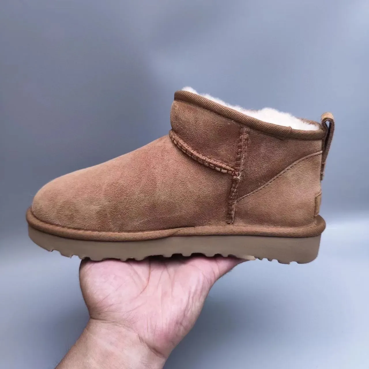 UGG क्लासिक मिनी चेस्टनट ब्राउन सूड शीयरलिंग लाइनड स्नो बूट 6